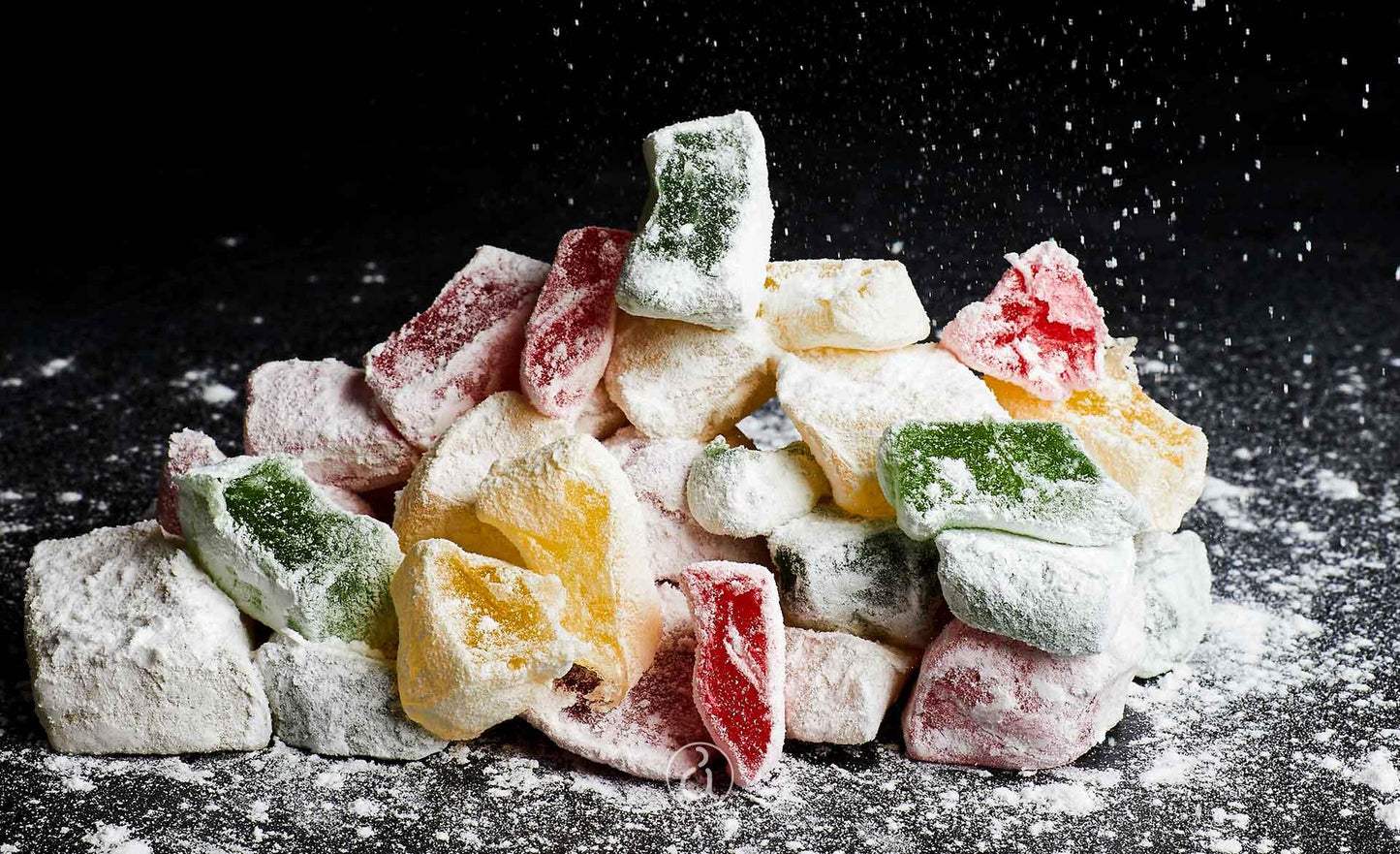 Greek Delights "Loukoumi", 400gr Loukoumiland Glutten Free Loukoumi, a chewy, rubbery-textured candy dusted in powdered sugar. It is made from gelatin or cornstarch, sugar, honey and fruit juice or jelly. Once the candy becomes firm, it is cut into small squares and coated with confectioners' sugar. Ingredients: sugar, glucose syrup, starch from corn,acidity regulator :citric acid, flavor, color,(riboflavin,plain caramel,carmine) Imported from Greece